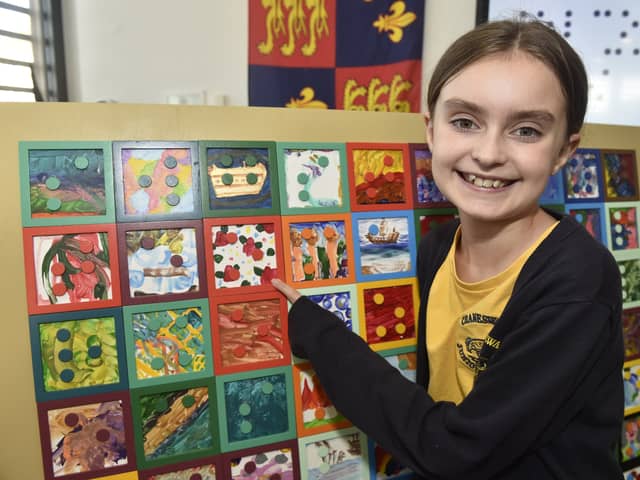 The Mary Rose Braille Word Search has been created by Portsmouth visually impaired artist, Clarke Reynolds, with help from students from Craneswater Junior School, including Eva Brinkman ,10 (pictured).