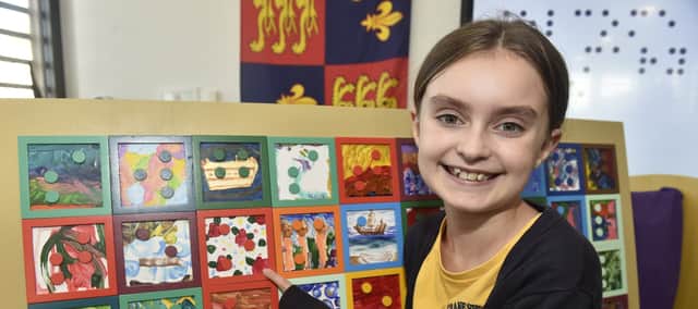 The Mary Rose Braille Word Search has been created by Portsmouth visually impaired artist, Clarke Reynolds, with help from students from Craneswater Junior School, including Eva Brinkman ,10 (pictured).