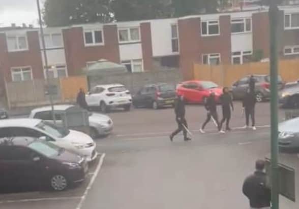 Men with weapons in Somerstown