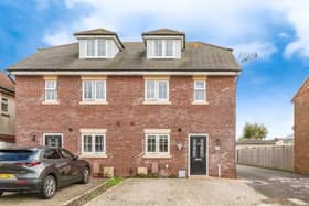 This home comes with three double bedrooms, two en-suite bathrooms, a family bathroom, two parking spaces and a spacious garden. 