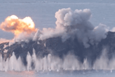 An island in the North Sea was bombed by Royal Navy pilots operating from HMS Prince of Wales during Exercise Strike Warrior.