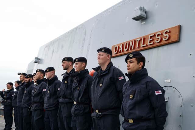 HMS Dauntless has been put through her paces on Exercise Strike Warrior after being upgraded and going through an essential maintenance programme. Pictured: Ship's company of HMS Dauntless standing on deck as she leaves Portsmouth.