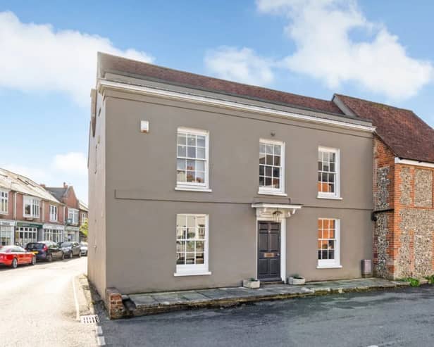 This home comes with three bedrooms, two bathrooms and two reception rooms. 