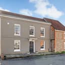 This home comes with three bedrooms, two bathrooms and two reception rooms. 