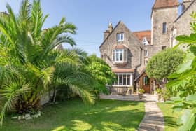 The listing says: "Occupying a prime waterfront and sought after location this attractive period house offers plenty of accommodation, private gardens and a new garage annexe or home office."