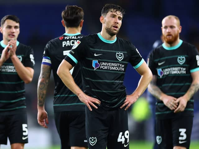 The Pompey players looked dejected at the final whistle against Cardiff