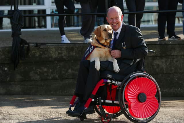 Veteran Allen Parton from Clanfield with his dog, ET at the Poppy Appeal launch at HMNB Portsmouth.