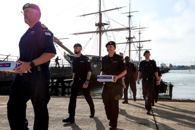 The Portsmouth poppy appeal was launched on October 24 with sailors bringing donation boxes from a landing craft involved in the Falklands War. Lt Cdr Steve Cass leads as a poppies are brought ashore from landing craft F8. Poppy Appeal launch at HMNB Portsmouth.
