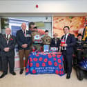 The Havant Poppy Appeal has been launched, with a call for residents to get behind the cause once again. Pictured: Mayor of Havant Cllr Peter Wade, second left, poppy appeal organiser for Havant Andy Carter MBE, third left, Alan Mak MP, fourth from right, Rick Standen who is chair of the Havant branch of the Royal British Legion, right, and others at the launch of the Havant Poppy Appeal at Tesco, Havant
Picture: Chris  Moorhouse (241024-04)