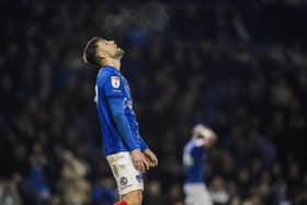 Callum Lang looks to the skies after Pompey's defeat to Sheffield Wednesday on Friday night