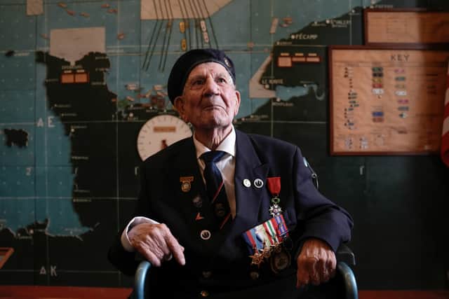 Normandy veteran George Chandler, 99, posing for a photograph in the Map room at Southwick House, the nerve centre of D-Day operations. Mr Chandler has died at the age of 99.