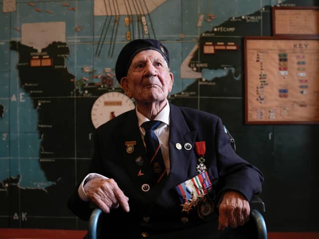Normandy veteran George Chandler, 99, posing for a photograph in the Map room at Southwick House, the nerve centre of D-Day operations. Mr Chandler has died at the age of 99.
