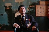 Normandy veteran George Chandler, 99, posing for a photograph in the Map room at Southwick House, the nerve centre of D-Day operations. Mr Chandler has died at the age of 99.