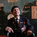 Normandy veteran George Chandler, 99, posing for a photograph in the Map room at Southwick House, the nerve centre of D-Day operations. Mr Chandler has died at the age of 99.