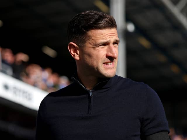 John Mousinho provided an injury update ahead of Portsmouth's trip to Hull City. He's got a big decision on his hands. (Photo by Tom Dulat/Getty Images)