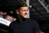 John Mousinho provided an injury update ahead of Portsmouth's trip to Hull City. He's got a big decision on his hands. (Photo by Tom Dulat/Getty Images)