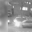 CCTV captures the moment three mourners are shot in a drive-by shooting at a funeral.