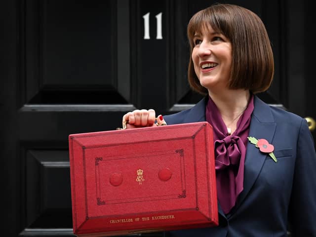 Rachel Reeves poses with the red Budget Box as she leaves 11 Downing Street to present the government's annual Autumn budget to Parliament (Photo: JUSTIN TALLIS/AFP via Getty Images)