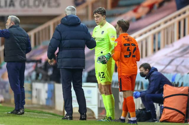 Goalkeeper Taylor Seymour (centre) played for Pompey in the Papa John's Trophy at Peterborough in January 2021. Picture: Nigel Keene/ProSportsImages