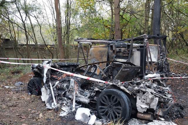 Police were called by the fire service at around 11pm on October 31 to a report of a car on fire in the woodland just off Vigo Lane, Yateley.
