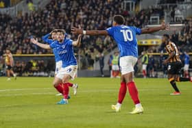 Callum Lang and Kusini Yengi appeal for a penalty in the second half of Pompey's 1-1 draw at Hul on Saturday