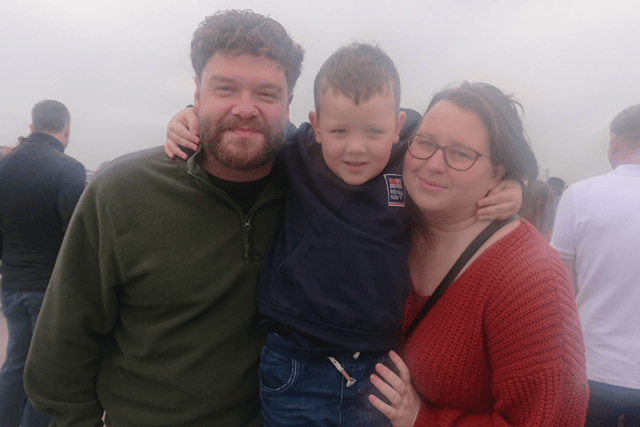 Loved ones of Officer Chloe Pink, of Lee-on-the-Solent, watching her leave on HMS Queen Elizabeth. From left: Chloe's uncle Ashley Caisley, Edward, aged four, and step-mum Sarah Ling.