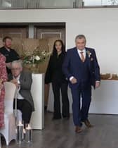 Neil Crossley walks down the aisle at his daughter's wedding, forgetting to take her with him.