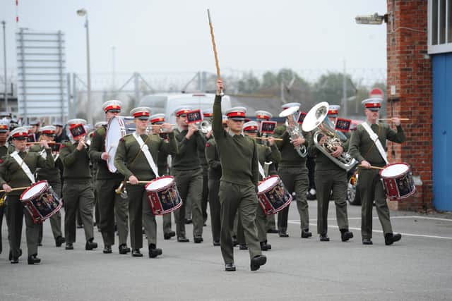 Personnel marching during training drills at HMS Excellent on Whale Island.