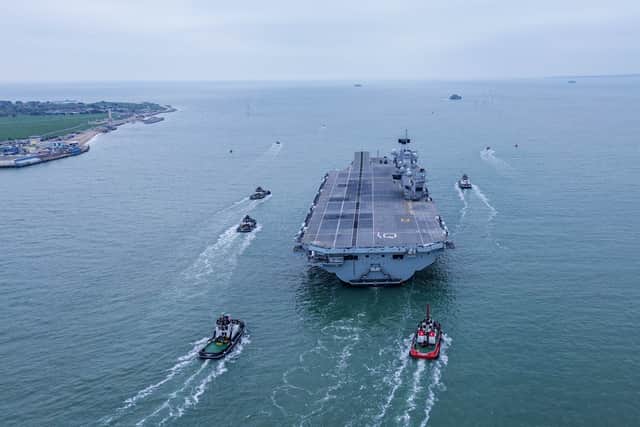 Royal Navy aircraft carrier HMS Queen Elizabeth leaving Portsmouth on November 4, 2024, for sea trials. She is now in Germany hosting diplomatic conferences.