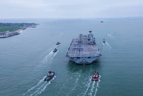 Royal Navy aircraft carrier HMS Queen Elizabeth leaving Portsmouth on November 4, 2024, for sea trials. She is now in Germany hosting diplomatic conferences.