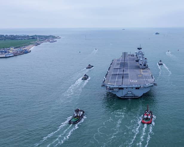 Royal Navy aircraft carrier HMS Queen Elizabeth leaving Portsmouth on November 4, 2024, for sea trials.