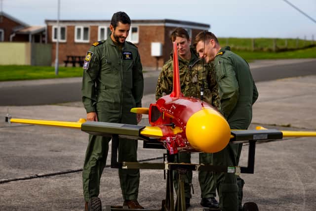 A Banshee drone being prepared before trials of Martlet missiles being fired from a Wildcat helicopter, an aircraft often used alongside HMS Queen Elizabeth and other warships.  The Royal Navy has successfully used a new helicopter missile to shoot down a drone without outside assistance for the first time.