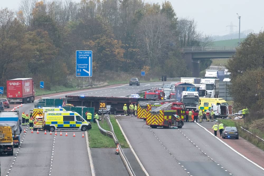 The M6 was closed a after lorry crashed through the central reservation near Preston