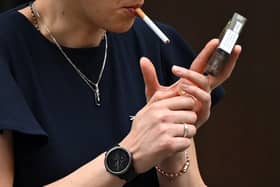 The government will be introducing a smoking ban, extending the indoor smoking ban to specific outdoor spaces.