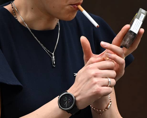 The government will be introducing a smoking ban, extending the indoor smoking ban to specific outdoor spaces.