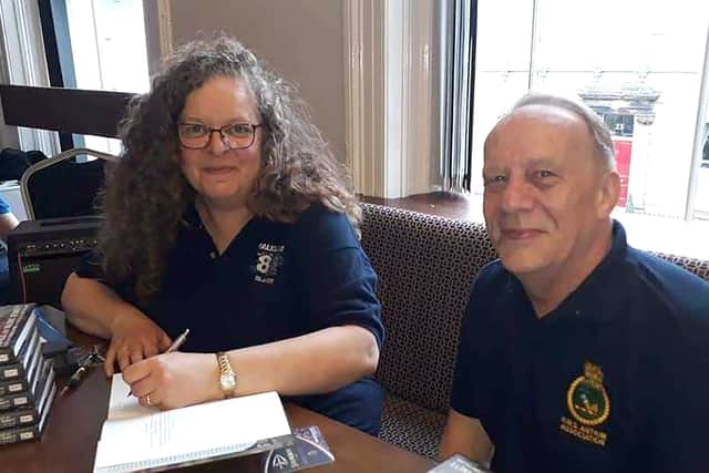 Rachel Simons (left) founded of Scarves For Falklands Veterans, with Neil Binder, a Falklands veteran who helps administer a Facebook page which co ordinates those who make the scarves and veterans who receive them.