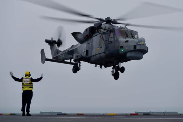 Pilots aboard HMS Queen Elizabeth carrying out aviation drills.