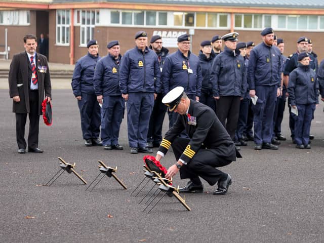 The commanding officer of HMS Sultan, captain Mark Hamilton lays a wreath at the Drumhead Ceremony.