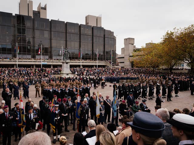 Portsmouth united to honour the fallen on Remembrance Sunday during a service in Guildhall Square.