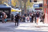 A man was arrested in Commercial Road, Portsmouth, on suspicion of supplying drugs. Pictured: Shoppers on the high street.