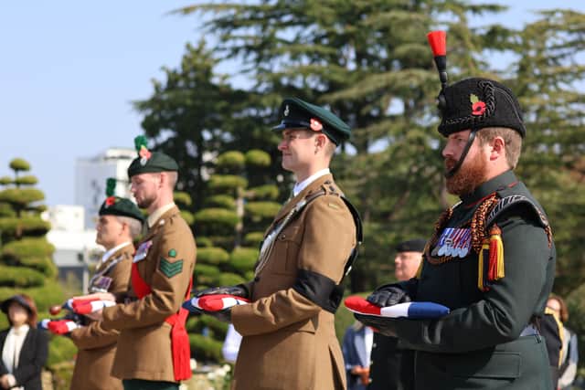 The services taking place at the United Nations Cemetery, Busan.