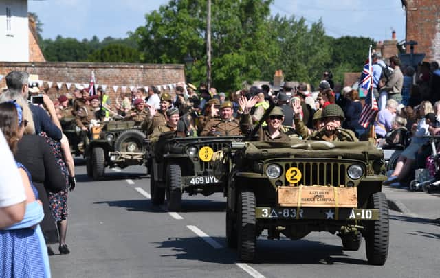 The vintage 1940s motorcade rolls through the High St of Southwick in June