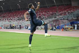 Pompey striker Kusini Yengi hit two goals for the Socceroos in Australia's 2-2 draw with Bahrain last night. Pic: AFP via Getty Images