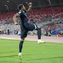 Pompey striker Kusini Yengi hit two goals for the Socceroos in Australia's 2-2 draw with Bahrain last night. Pic: AFP via Getty Images