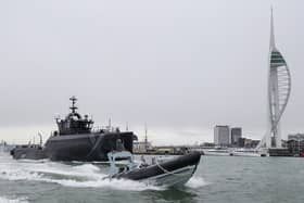 An un-crewed Pacific 24 rigid inflatable boat was remotely controlled from Royal Navy experimentation ship XV Patrick Blackett while the pair sailed off the coast of Portsmouth.