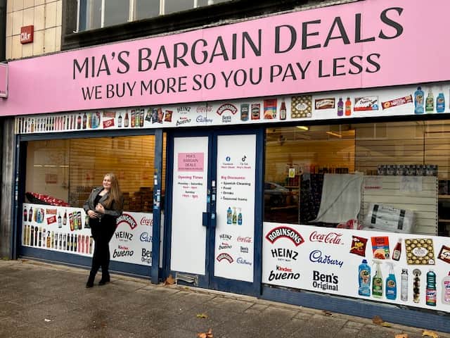 Mia Clements outside Mia's Bargain Deals