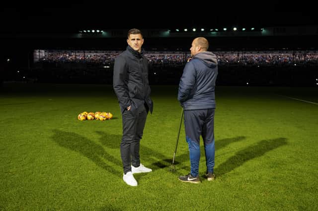 John Mousinho waits for news of Pompey's encounter with Millwall after the Fratton Park lights went out on Wednesday evening. Picture: Jason Brown/ProSportsImages