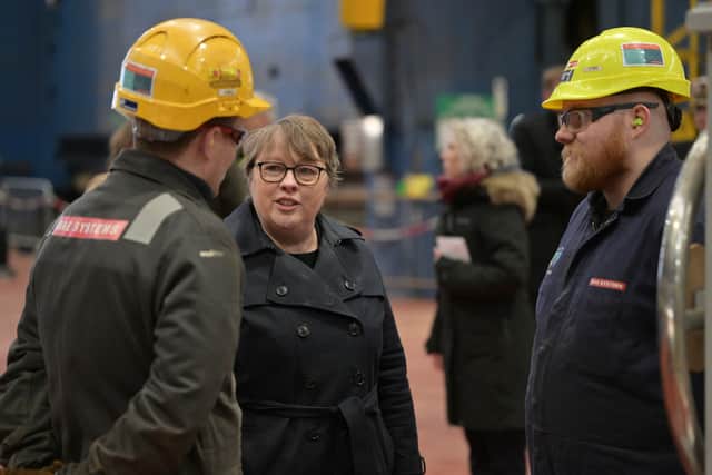 Maria Eagle MP, minster for defence procurement, with BAE Systems fabricator burners at the shipyard in Scotland. HMS Sheffield is the latest Type 26 frigate under construction.