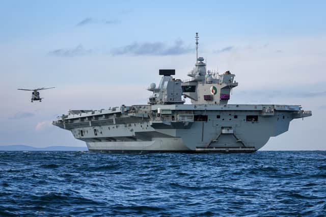 HMS Queen Elizabeth will return to Portsmouth this evening following a diplomatic visit to Germany and a recent run-in with a drone.
Pictured: HMS Queen Elizabeth conducted some flying training as well as boat drills on November 26.