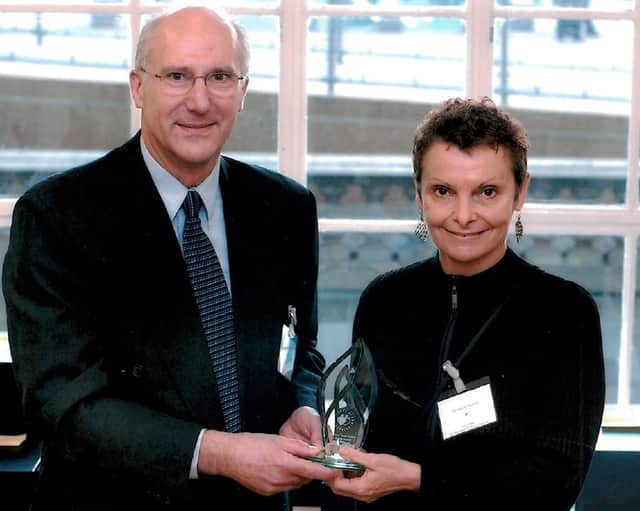 Maggie Hackney receiving an award